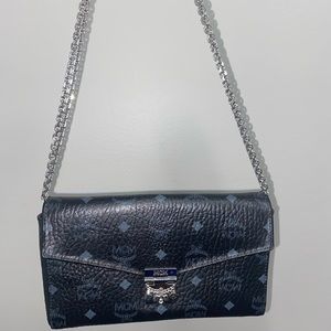 MCM Women’s Black leather crossbody purse.